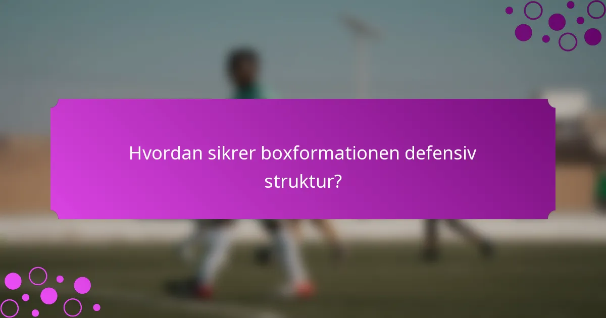 Hvordan sikrer boxformationen defensiv struktur?